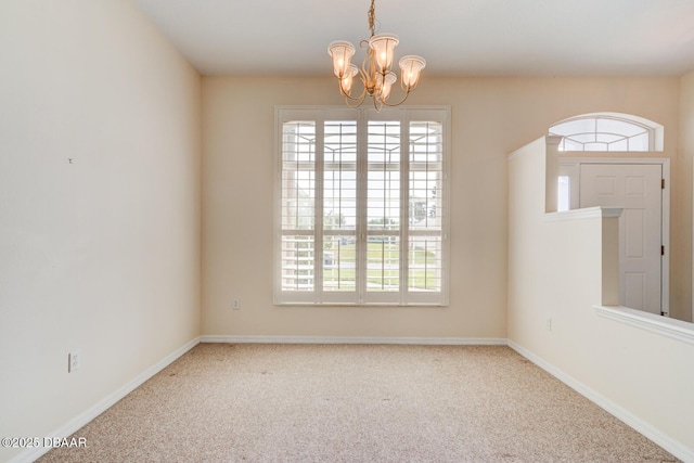12 Sea Swallow Ter, Ormond Beach, FL 32176 - carpeted empty room featuring a chandelier and healthy amount of natural light