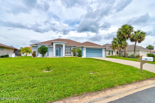 12 Sea Swallow Ter, Ormond Beach, FL 32176 - ranch-style home with driveway, a garage, a front lawn, and stucco siding