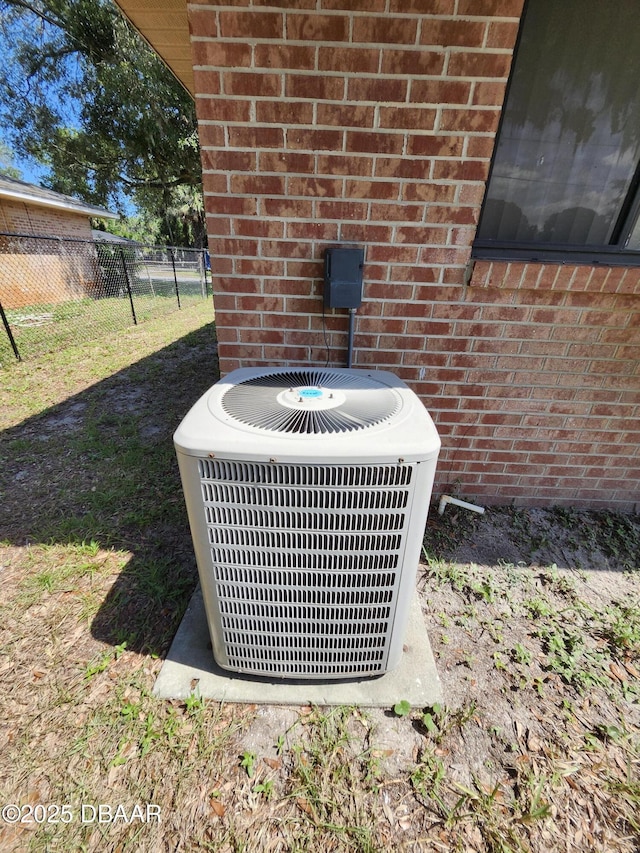 812 S Kottle Cir Unit S, Daytona Beach, FL 32114 - exterior view of central air condition unit and brick siding