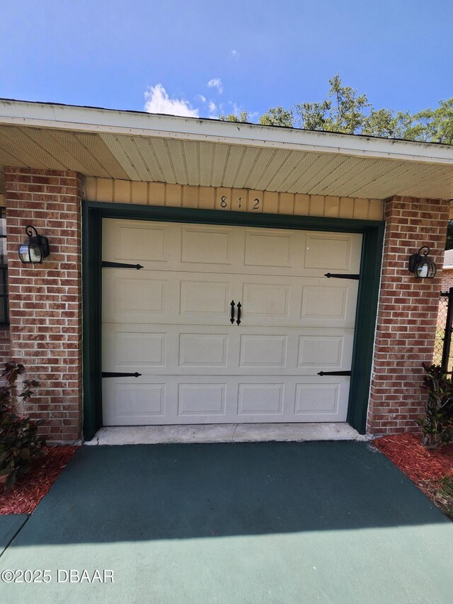 812 S Kottle Cir Unit S, Daytona Beach, FL 32114 - garage with driveway