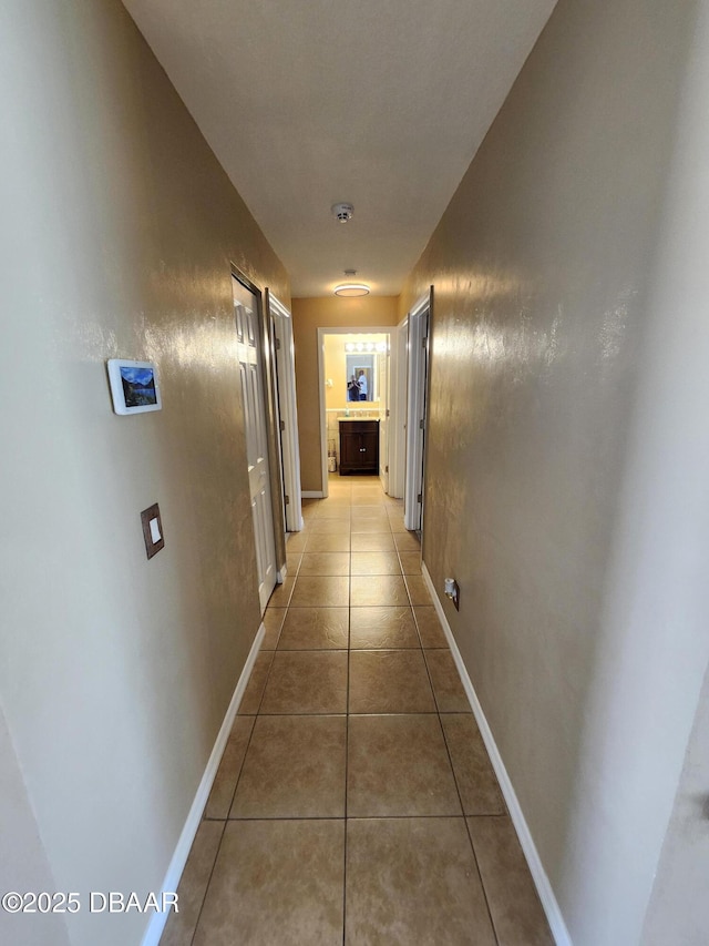 812 S Kottle Cir Unit S, Daytona Beach, FL 32114 - hall featuring light tile patterned floors and baseboards