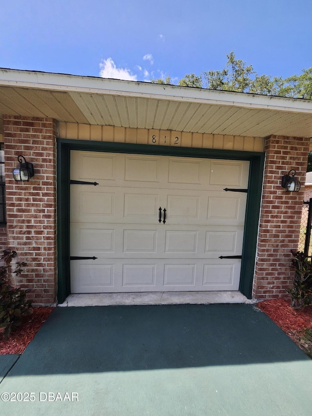812 S Kottle Cir Unit S, Daytona Beach, FL 32114 - garage with driveway