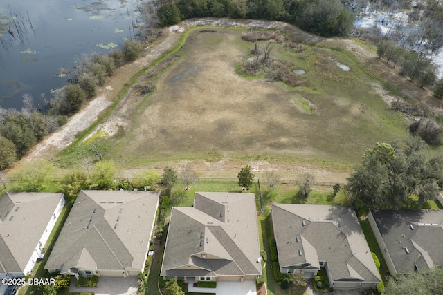 bird's eye view with a water view and a residential view