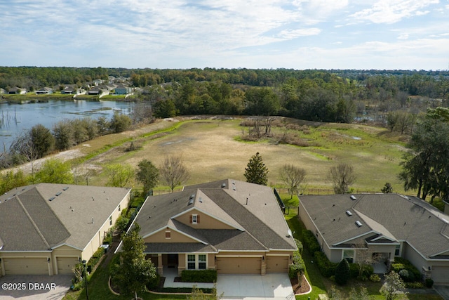 bird's eye view with a water view