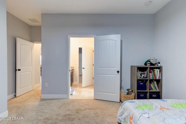 bedroom featuring baseboards, connected bathroom, visible vents, and light colored carpet