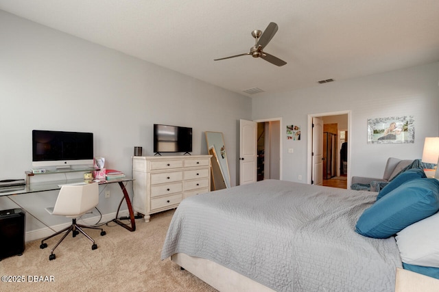 carpeted bedroom with ceiling fan, visible vents, and baseboards