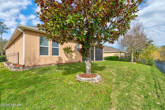 view of yard with a fenced backyard