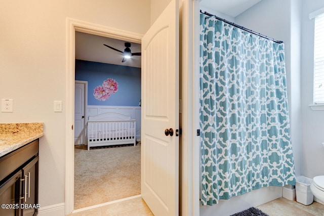 bathroom featuring toilet and vanity