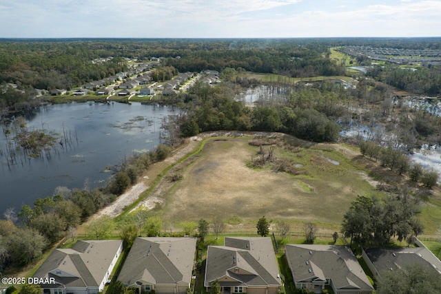 aerial view featuring a residential view and a water view