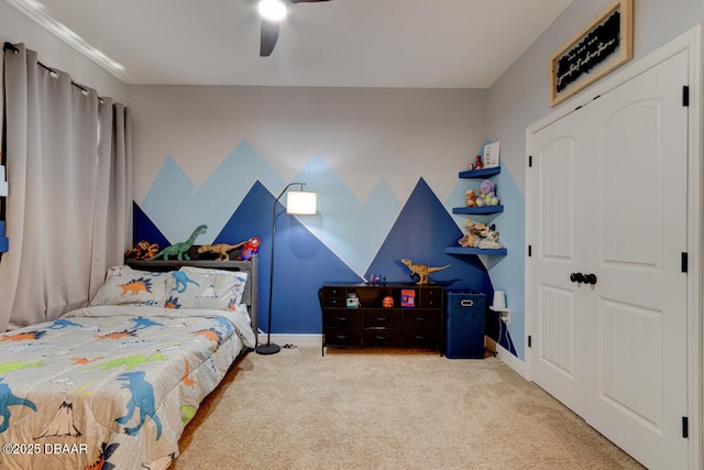 bedroom with a ceiling fan, carpet, and baseboards