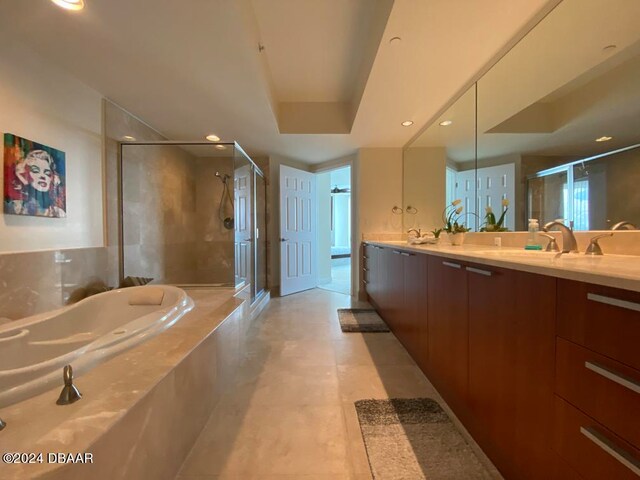 bathroom with vanity and plus walk in shower