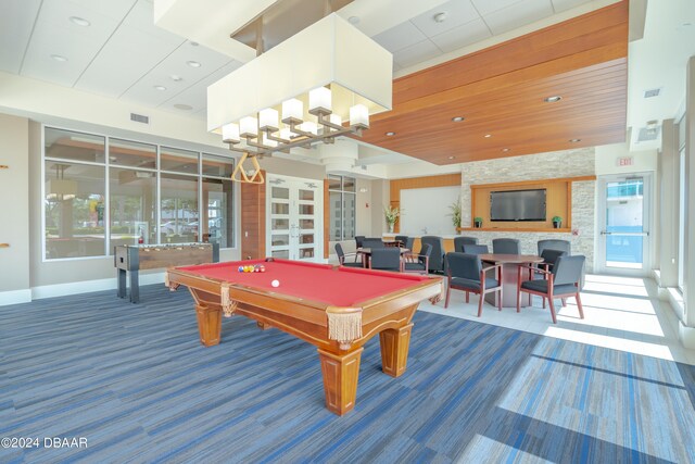 recreation room featuring pool table, carpet, and french doors