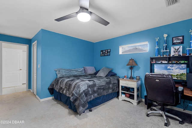 carpeted bedroom with ceiling fan