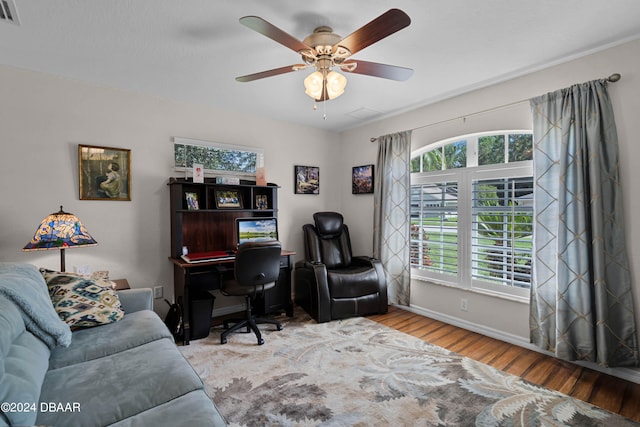 office area featuring light wood-type flooring and ceiling fan