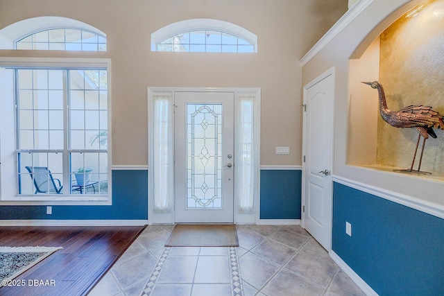 entryway with light tile patterned floors