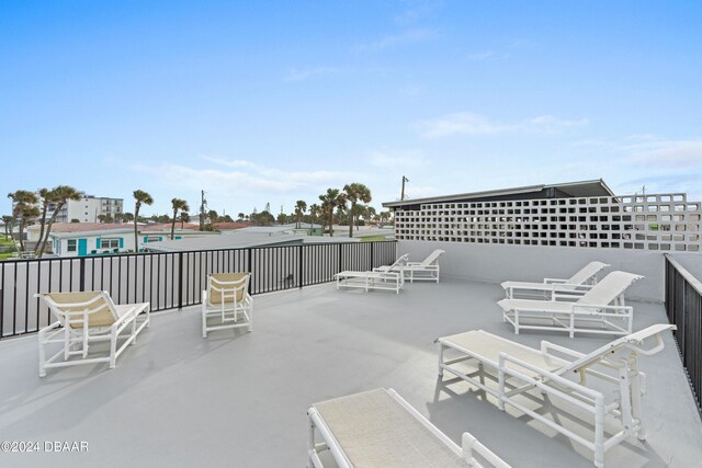 view of patio with a water view