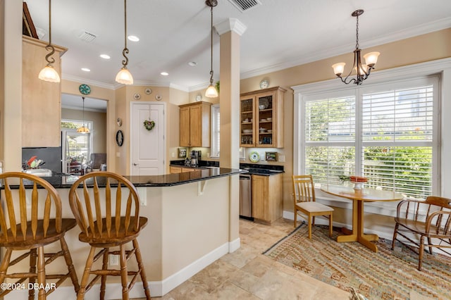 kitchen featuring dishwasher, a notable chandelier, kitchen peninsula, pendant lighting, and a breakfast bar area