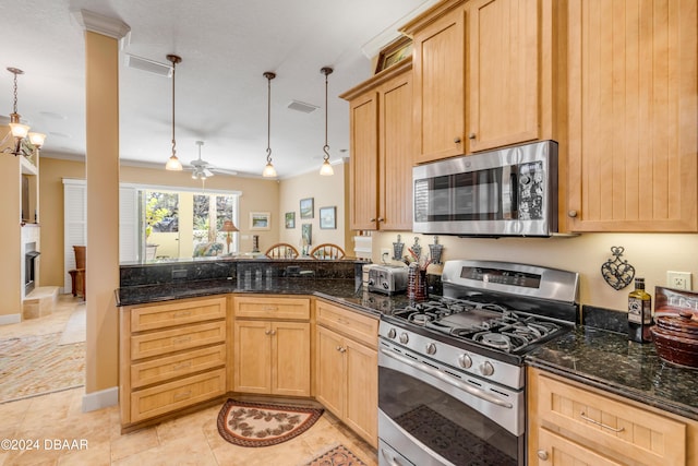 kitchen with ceiling fan, light brown cabinets, decorative light fixtures, appliances with stainless steel finishes, and ornamental molding