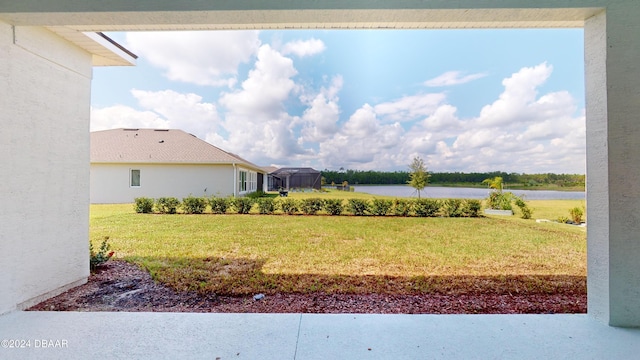 view of yard with a water view