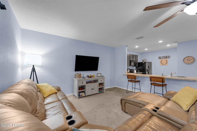 1615 Primo Ct, Holly Hill, FL 32117 - living room featuring carpet floors, ceiling fan, baseboards, and recessed lighting