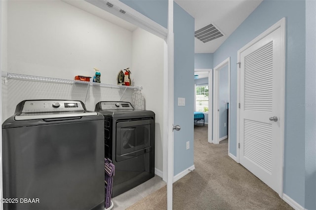 1615 Primo Ct, Holly Hill, FL 32117 - washroom featuring washing machine and dryer, carpet flooring, and baseboards