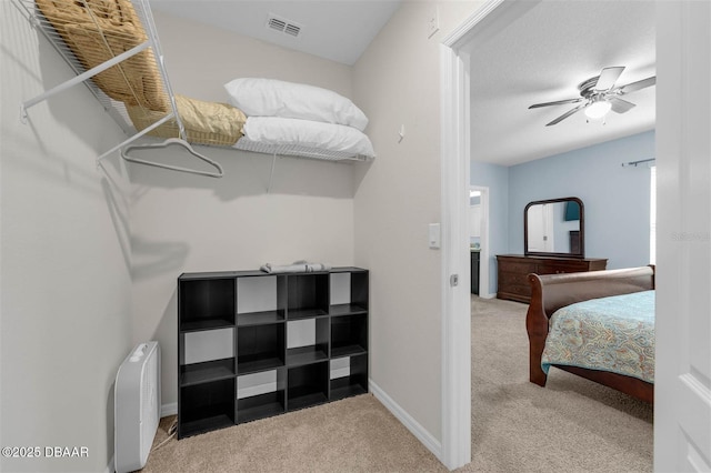 1615 Primo Ct, Holly Hill, FL 32117 - spacious closet featuring carpet flooring and a ceiling fan