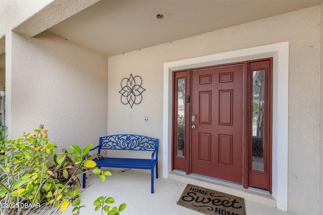 1615 Primo Ct, Holly Hill, FL 32117 - doorway to property with stucco siding