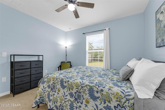 1615 Primo Ct, Holly Hill, FL 32117 - bedroom with carpet flooring, a ceiling fan, and baseboards