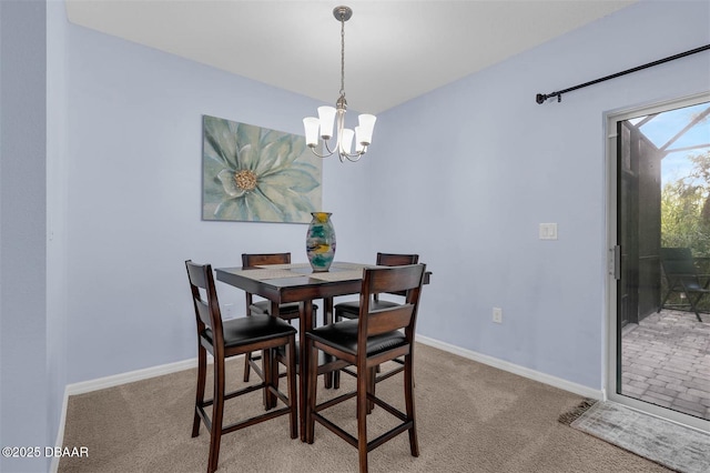 1615 Primo Ct, Holly Hill, FL 32117 - carpeted dining space with a chandelier and baseboards