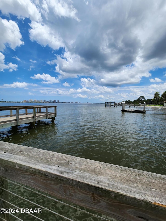 view of dock with a water view