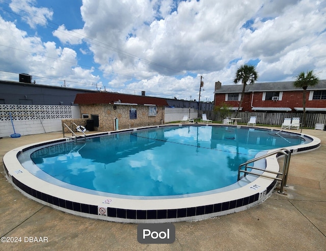 pool featuring fence