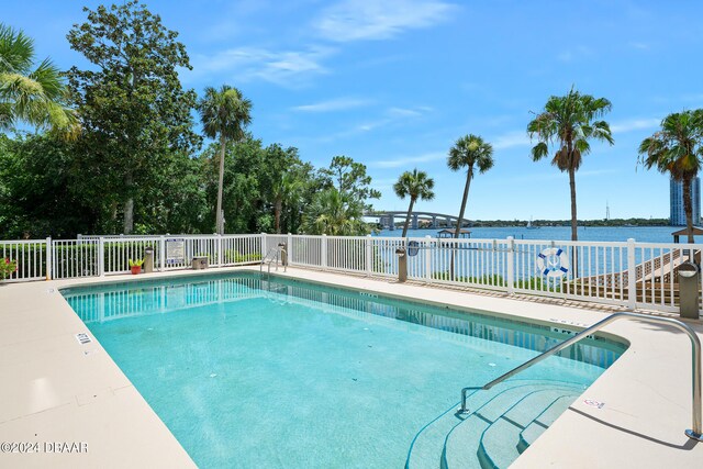 711 N Halifax Ave Unit 405, Daytona Beach, FL 32118 - view of pool featuring a water view