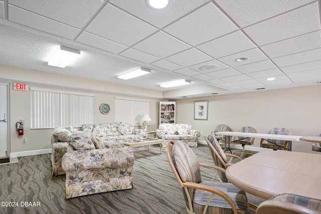711 N Halifax Ave Unit 405, Daytona Beach, FL 32118 - carpeted living room with a drop ceiling