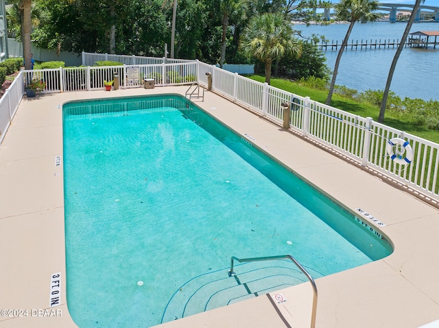 711 N Halifax Ave Unit 405, Daytona Beach, FL 32118 - view of swimming pool with a water view
