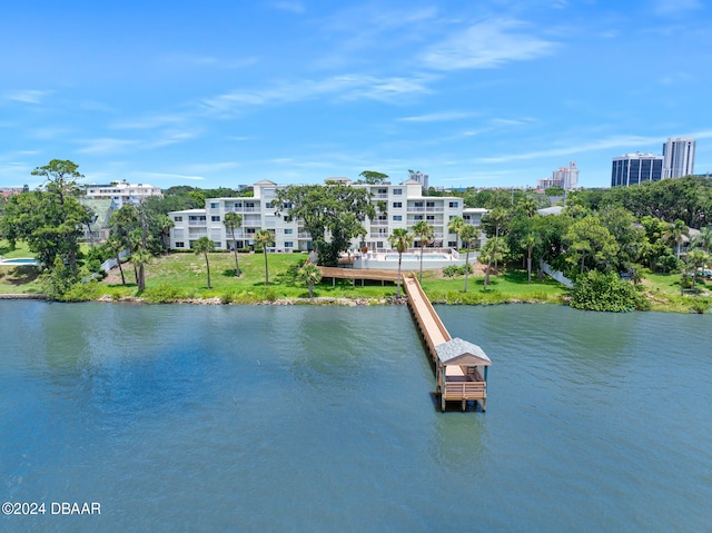 711 N Halifax Ave Unit 405, Daytona Beach, FL 32118 - property view of water featuring a dock