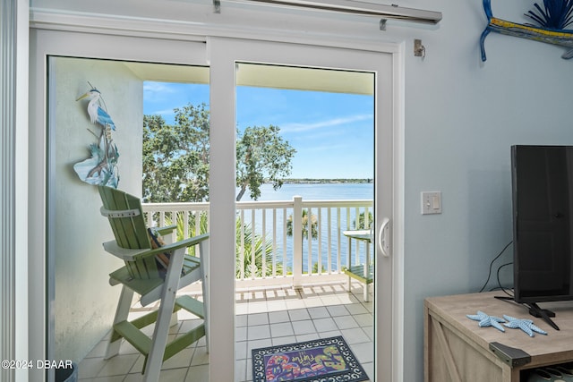 711 N Halifax Ave Unit 405, Daytona Beach, FL 32118 - doorway to outside featuring light tile patterned floors