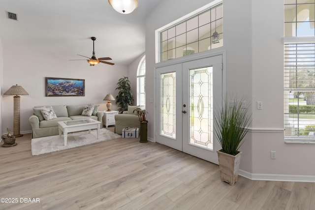 1320 Antrim Cir, Ormond Beach, FL 32174 - foyer entrance featuring wood finished floors, a ceiling fan, visible vents, and a wealth of natural light