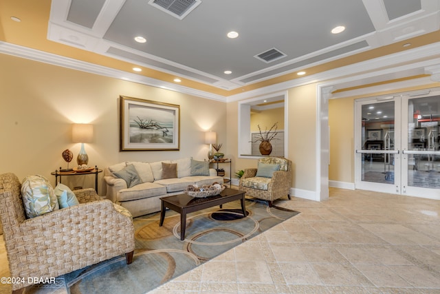 living room featuring french doors and crown molding