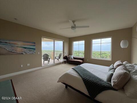 bedroom featuring access to exterior, carpet, and ceiling fan