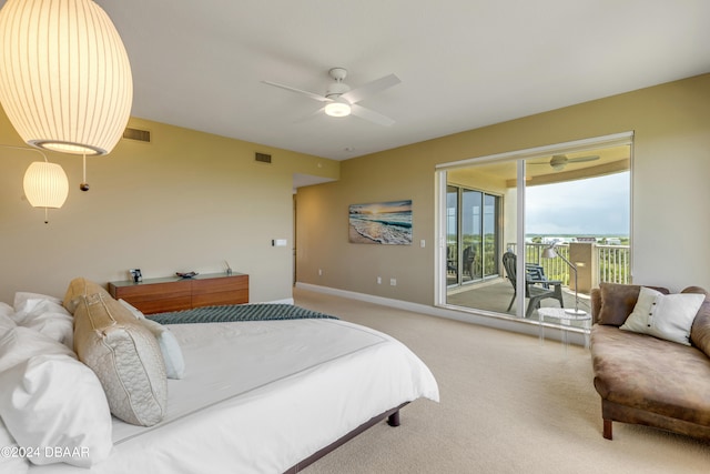 carpeted bedroom with access to outside and ceiling fan