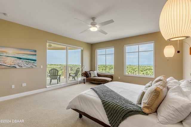 bedroom with access to outside, carpet, and ceiling fan