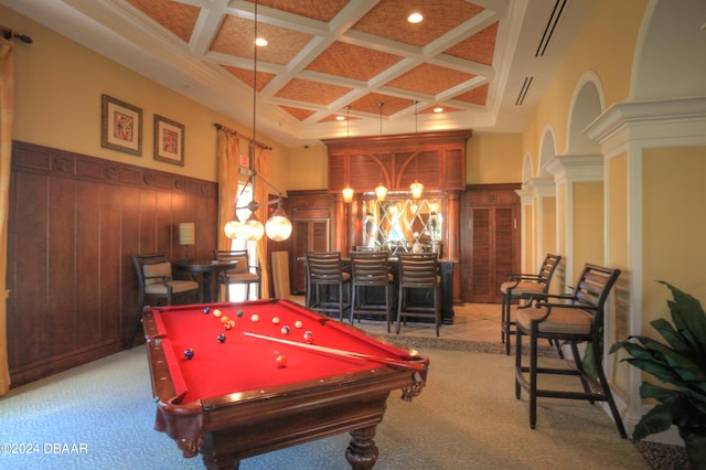 playroom featuring coffered ceiling, a towering ceiling, light colored carpet, and beamed ceiling