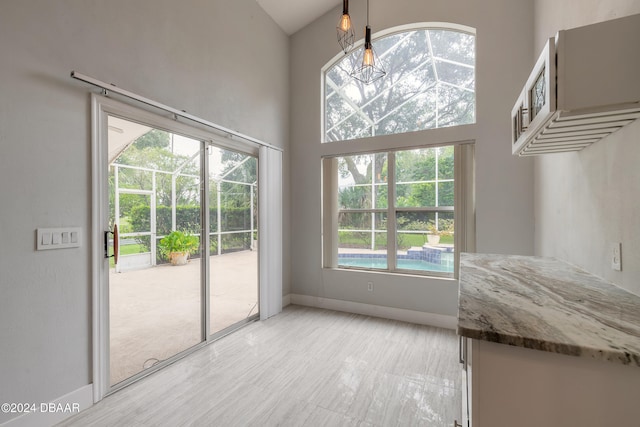 interior space with high vaulted ceiling