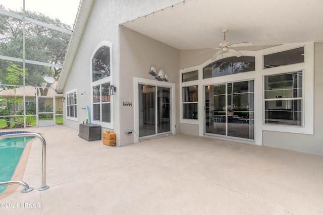 exterior space featuring a patio area, a lanai, and ceiling fan