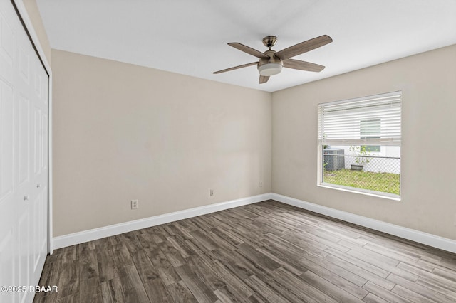 empty room featuring ceiling fan and wood-type flooring