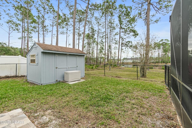 view of yard with a storage shed