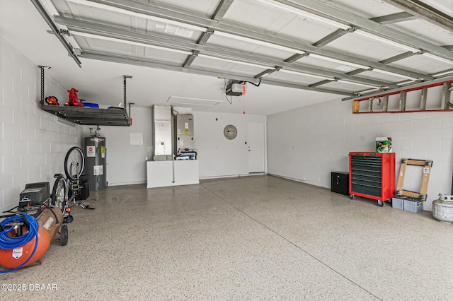 garage with a garage door opener and water heater