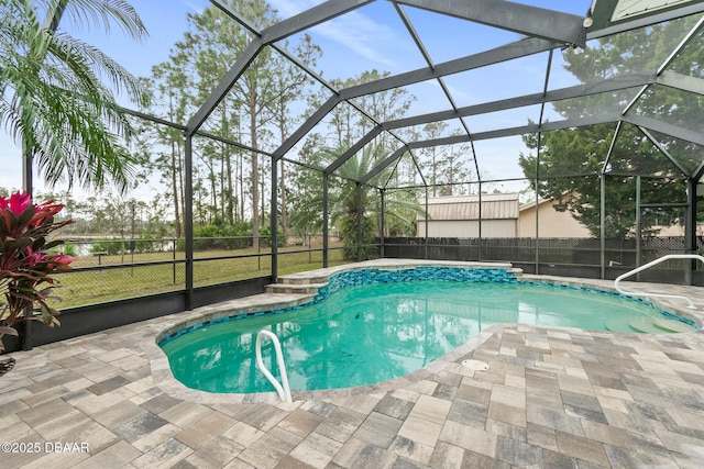 view of pool featuring a patio and a lanai