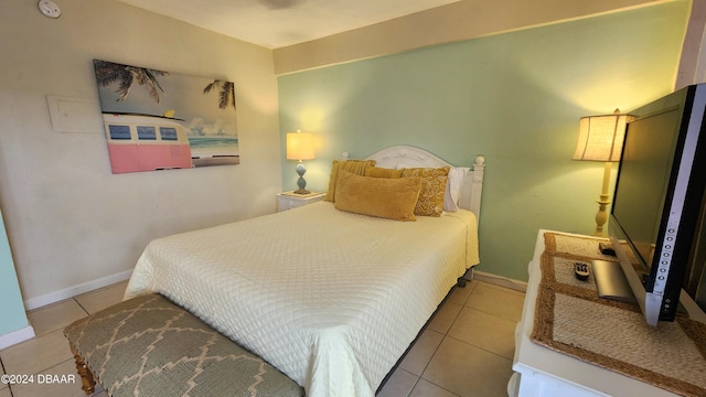 219 S Atlantic Ave Unit 235, Daytona Beach, FL 32118 - tiled bedroom with baseboards