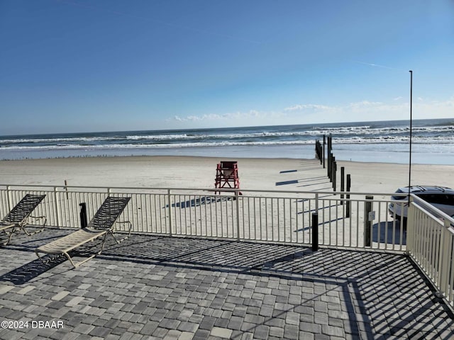 exterior space with a view of the beach and a water view